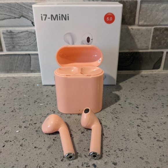 Wireless earbuds with charging station brand new in box !! - Picture 2 of 2